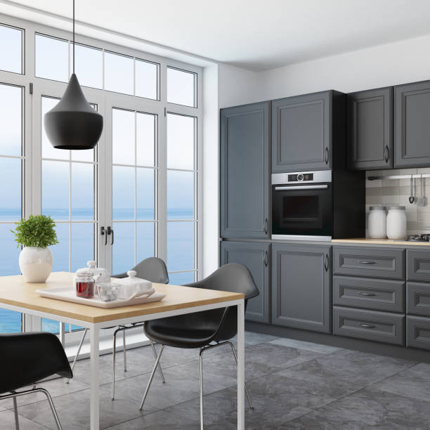 istock Modern Scandinavian kitchen and dining room with matte black traditional cabinet design 1267056965