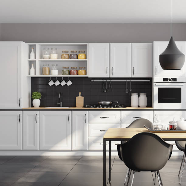 istock Modern Scandinavian kitchen and dining room with matte white traditional design cabinets 1267058757