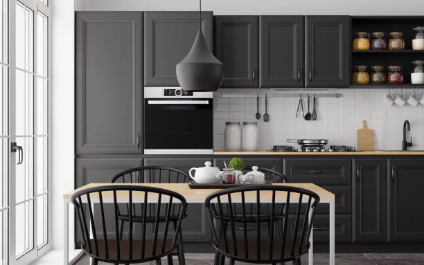 istock Modern Scandinavian kitchen and dining room with matte black traditional cabinet design 1267060004