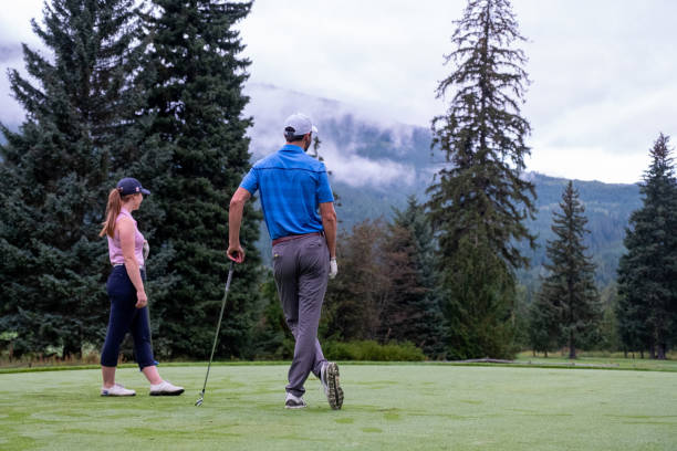 istock Two golfers discuss the tee shot 1267063734