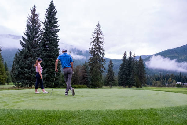 istock Two golfers discuss the tee shot 1267064262