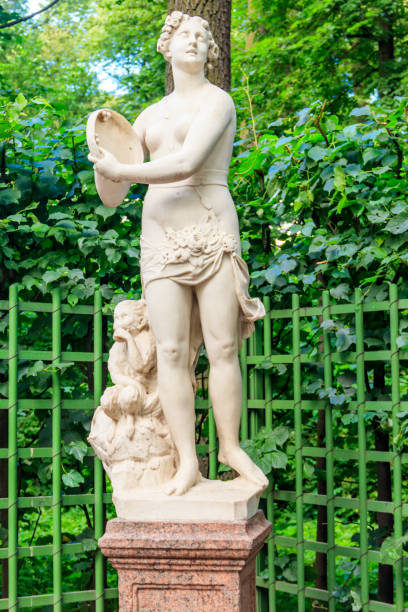 statue "youth" in old city park "summer garden" in st. petersburg, russia - statue architecture sculpture formal garden imagens e fotografias de stock