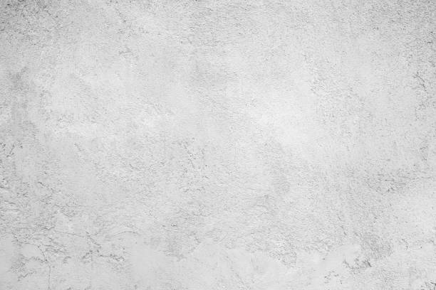 istock Abstract white grunge cement or concrete wall texture background, White cement wall texture for interior design for the background. The black and white concept of a plain white plastered brick. 1267071479