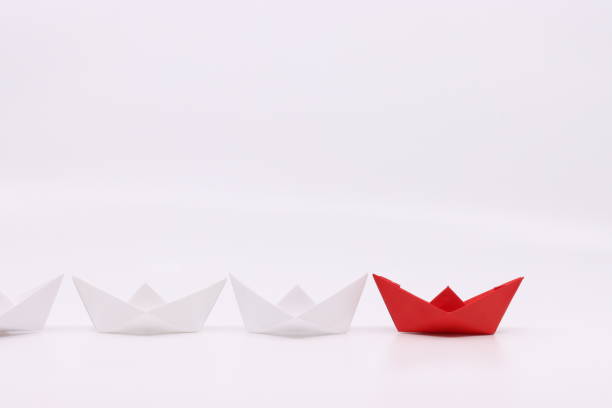 istock paper boat isolated in white background 1267072315