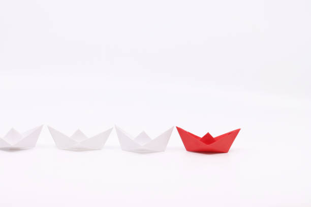 istock paper boat isolated in white background 1267072317
