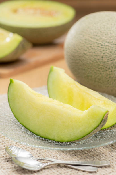 istock Fresh green melon cut on the table 1267073379