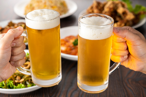Beer and food on restaurant table