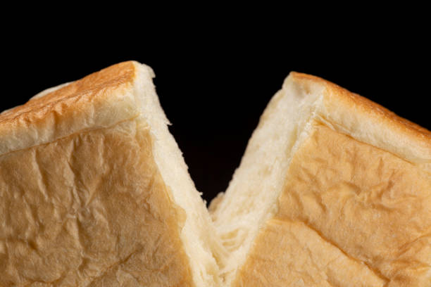 Shred freshly baked bread by hand