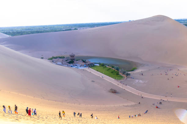 Yueyaquan Scenic Area, Mingsha Mountain, Dunhuang City, Gansu Province, China. Gansu Dunhuang Crescent Lake and Mingsha Mountain,China