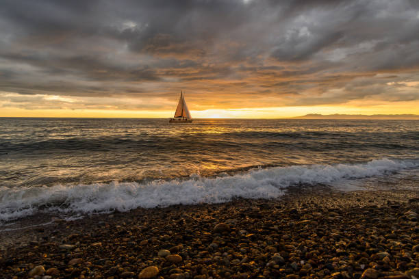 istock Sunset Ocean Sailboat 1267081503