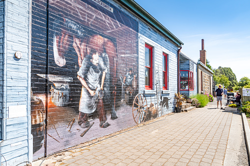 Mural graffiti was painting on the wall at the street in Sheffield town in Tasmania, Australia.