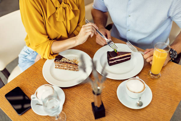 istock Let me try some of your cake! 1267084827