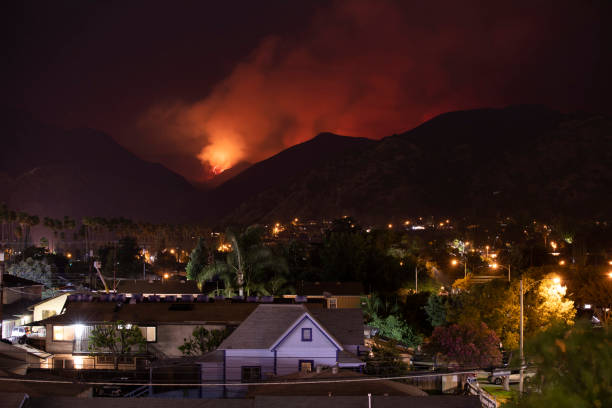 California Wildfire A wildfire burns above the city of Azusa, California. forest fire photos stock pictures, royalty-free photos & images