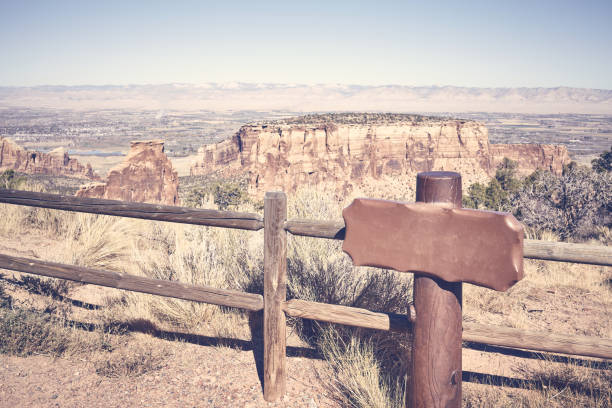 Viewpoint with empty board sign, Colorado National Monument Park, color toned picture, Colorado, USA.