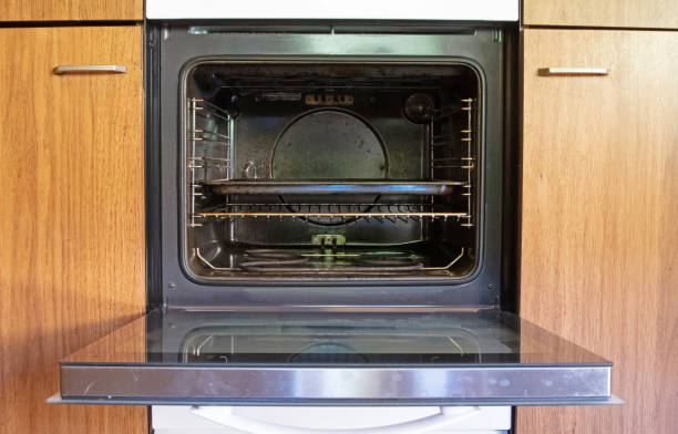 istock Old antique kitchen with dirty oven 1267092455