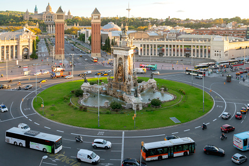 Plaza d'Espanya. Central plaza bordered by architectural landmarks, with fountain shows, shopping and an arena.