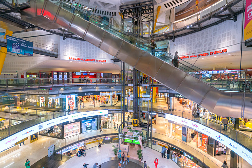 Barcelona Spain Nov 04 2019:crowd people tourists shopping and walking in Arenas de Barcelona big oval hall interior with escalator Arenas de Barcelona is new shopping mall with Placa Espanya