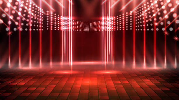 istock abstract futuristic background of red empty stage and neon lighting spotlgiht stage background 1267097377