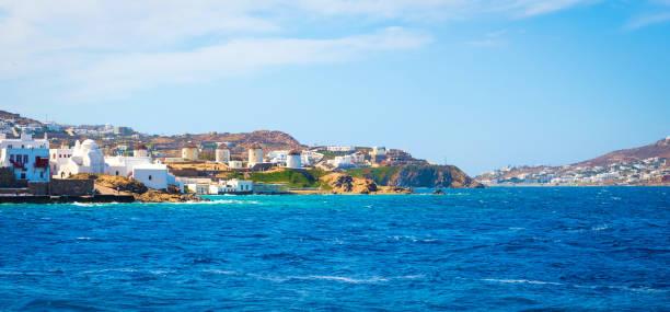 Beautiful view to Mykonos windmills from seaside