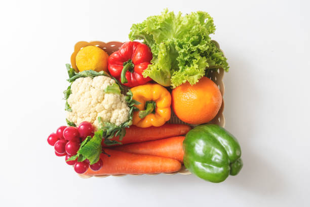 istock Fresh vegetables in basket box on white table background. 1267100218