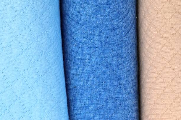istock Detailed close up view on samples of cloth and fabrics in different colors found at a fabrics market 1267104841