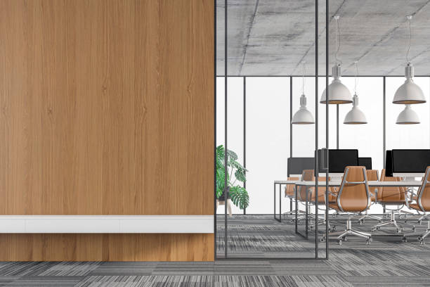 istock Empty office interior with copy space and wordesks on carpet floor stock photo 1267104844