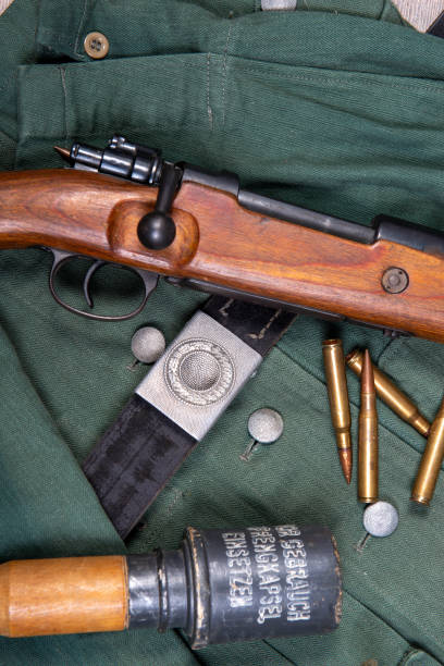 a vintage background with german army field equipment. ww2