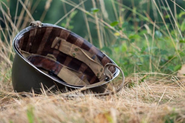 Rusty and holed military helmet, found on the locations of past battles