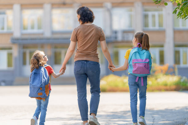 istock Parent and pupils go to school 1267107150