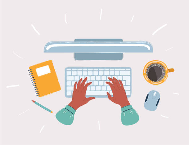 istock Workplace. Top view of wooden desk with a computer and typing hands 1267108582