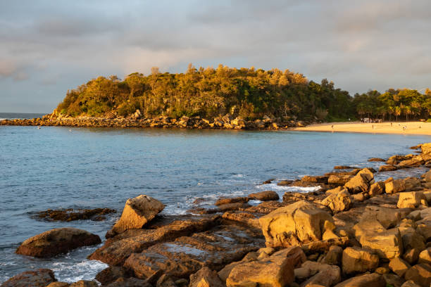 istock Shelly Beach Blue Waters and North Head Background Blur 1267111521