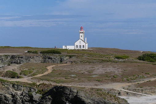 The lighthouse of the foals of Belle-Île en Mer in Brittany is a must-see place to visit, it dominates the tip of Sauzon, breathtaking fantastic landscape