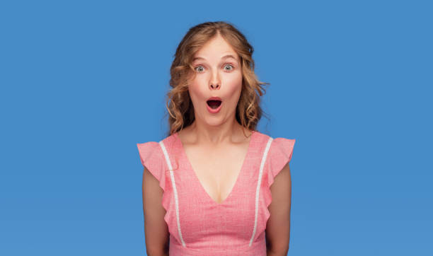 istock Astonished young female looking at camera 1267112760