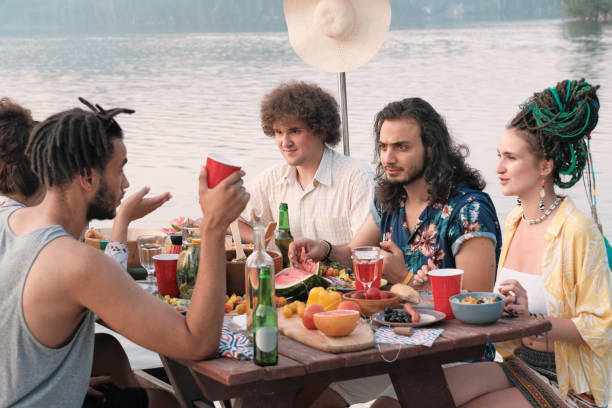 istock Friends on a picnic outdoors 1267112817