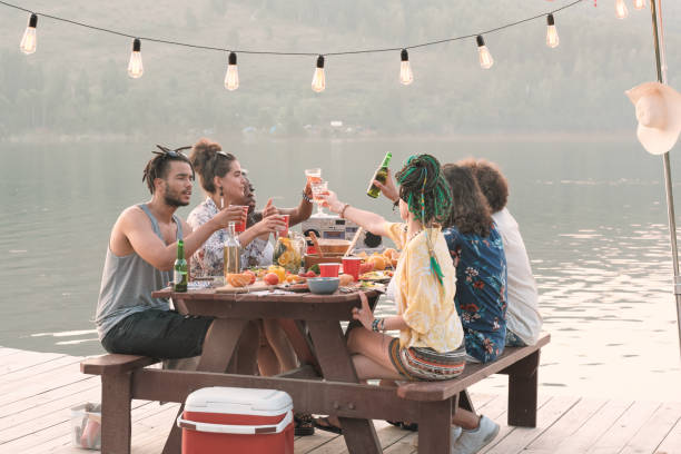 istock Young people have lunch on a pier 1267112847