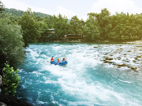 Antalya, Turkey - June 28, 2019: A group of tourist rafting on Beşkonak Köprülü Canyon that is one of the most popular place for rafting in Turkey.