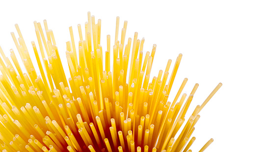 close up on tips of dry spaghetti