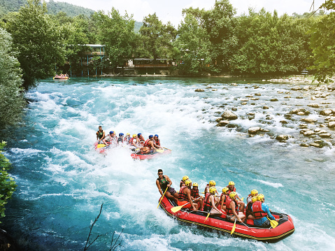 Antalya, Turkey - June 28, 2019: A group of tourist rafting on Beşkonak Köprülü Canyon that is one of the most popular place for rafting in Turkey.