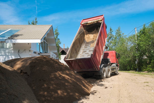 istock excavator digs clay soil at the construction site 1267115661