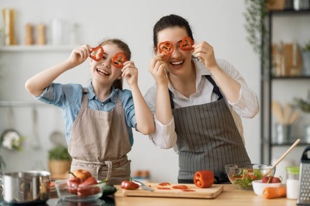 istock Happy family in the kitchen. 1267116965