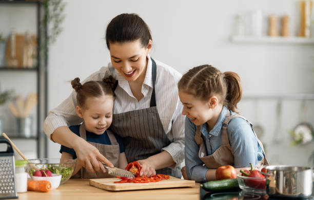 istock Happy family in the kitchen. 1267116983