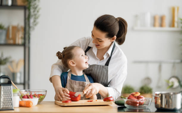 istock Happy family in the kitchen. 1267117010