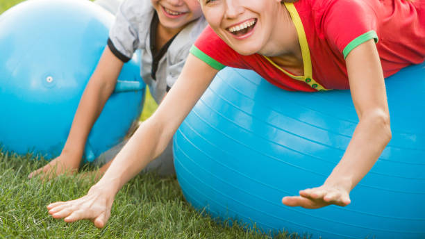 istock Mother and son exercising outdoors on a sunny day 1267117870