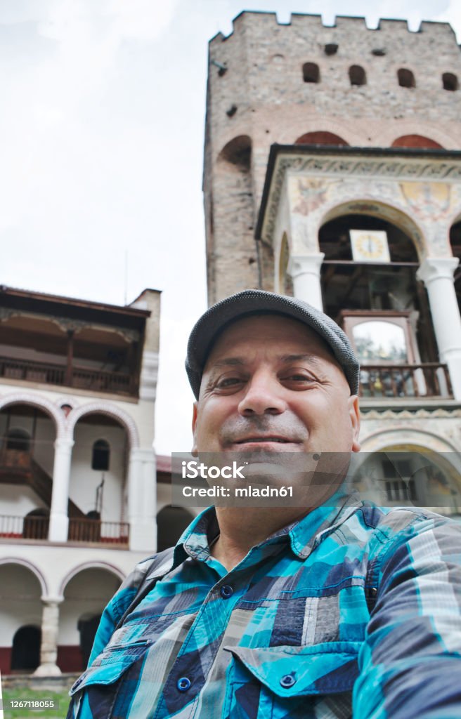 Selfie in Rila Monastery Me in the yard of Rila Monastery, Rila mountain, Bulgaria. Rila Monastery Stock Photo