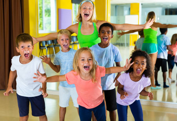 istock Happy children in dance studio smiling and having fun 1267121468