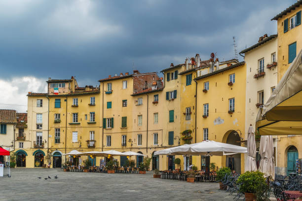 istock Piazza Amphitheater, Lucca, Italy 1267123832