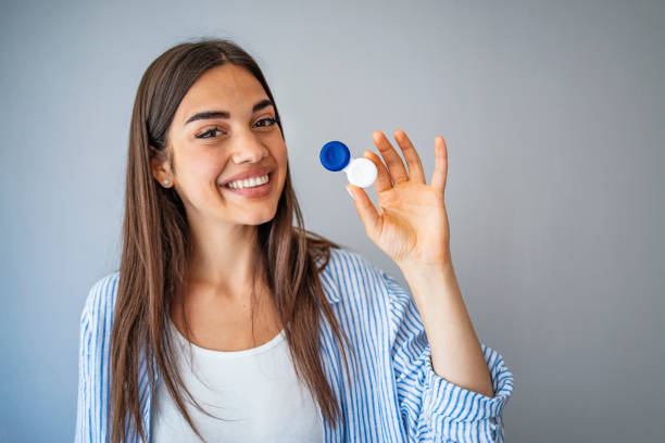 Happy Woman Holding Contact Lenses Case.