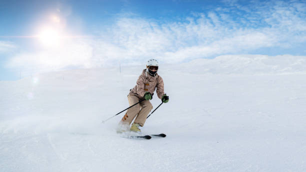 istock Woman skiing 1267125038