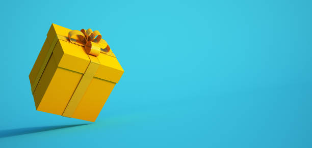 istock Gift box background in yellow and turquoise 1267126532