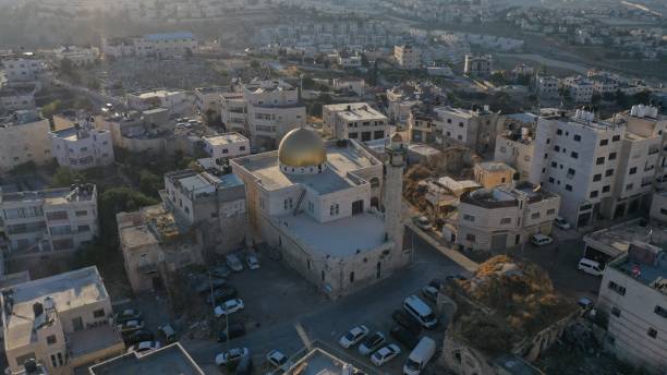 istock Golden Dome Mosque in Palestine Refugees camp Anata 1267131707
